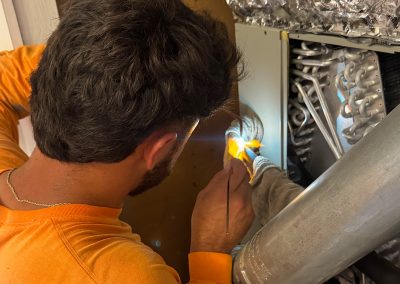 Arrow Appliance Heating and Air Conditioning running HVAC Inspections on a residential property